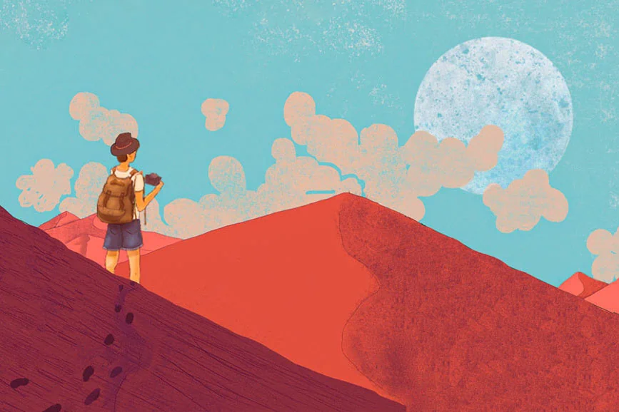 travel photographer in a desert