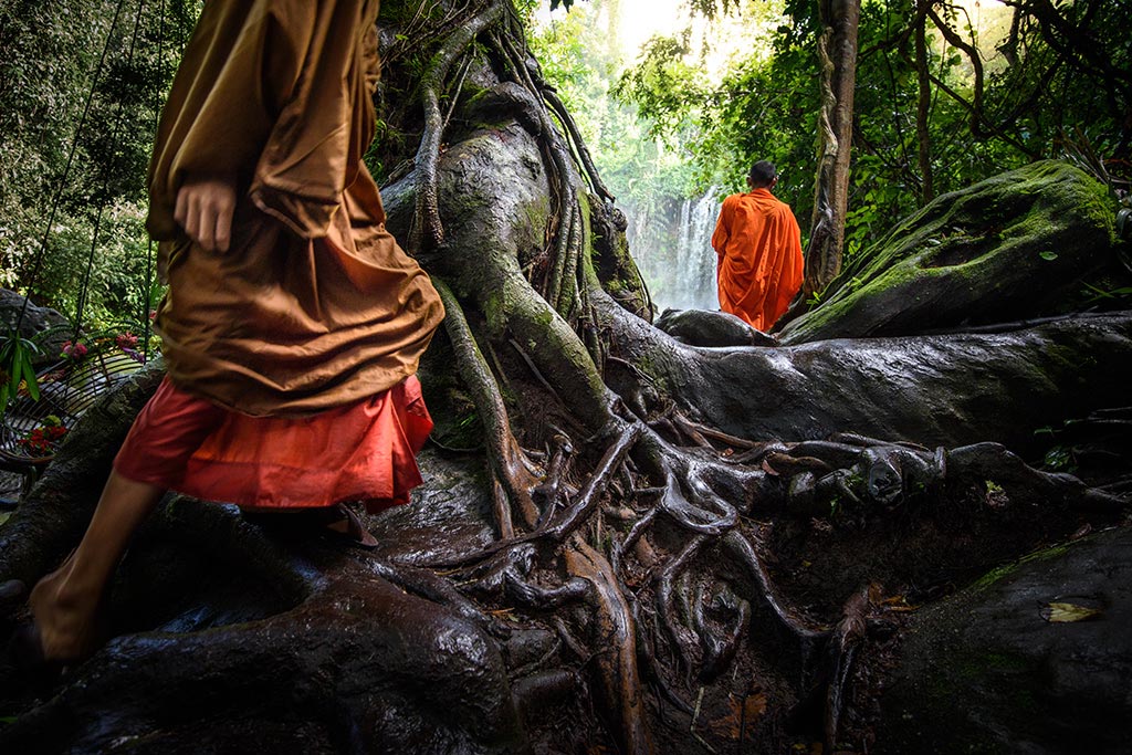 Monks at the Kulen Waterfalls in Cambodia